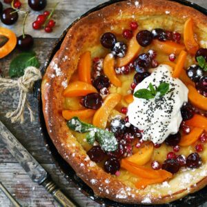 A Lavish Dutch Baby With Grilled Peaches | Cooking Clue